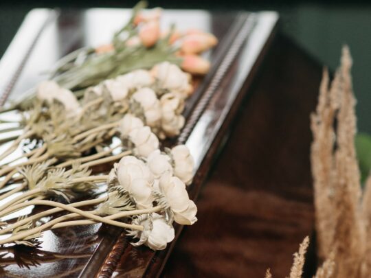 casket with flowers on it
