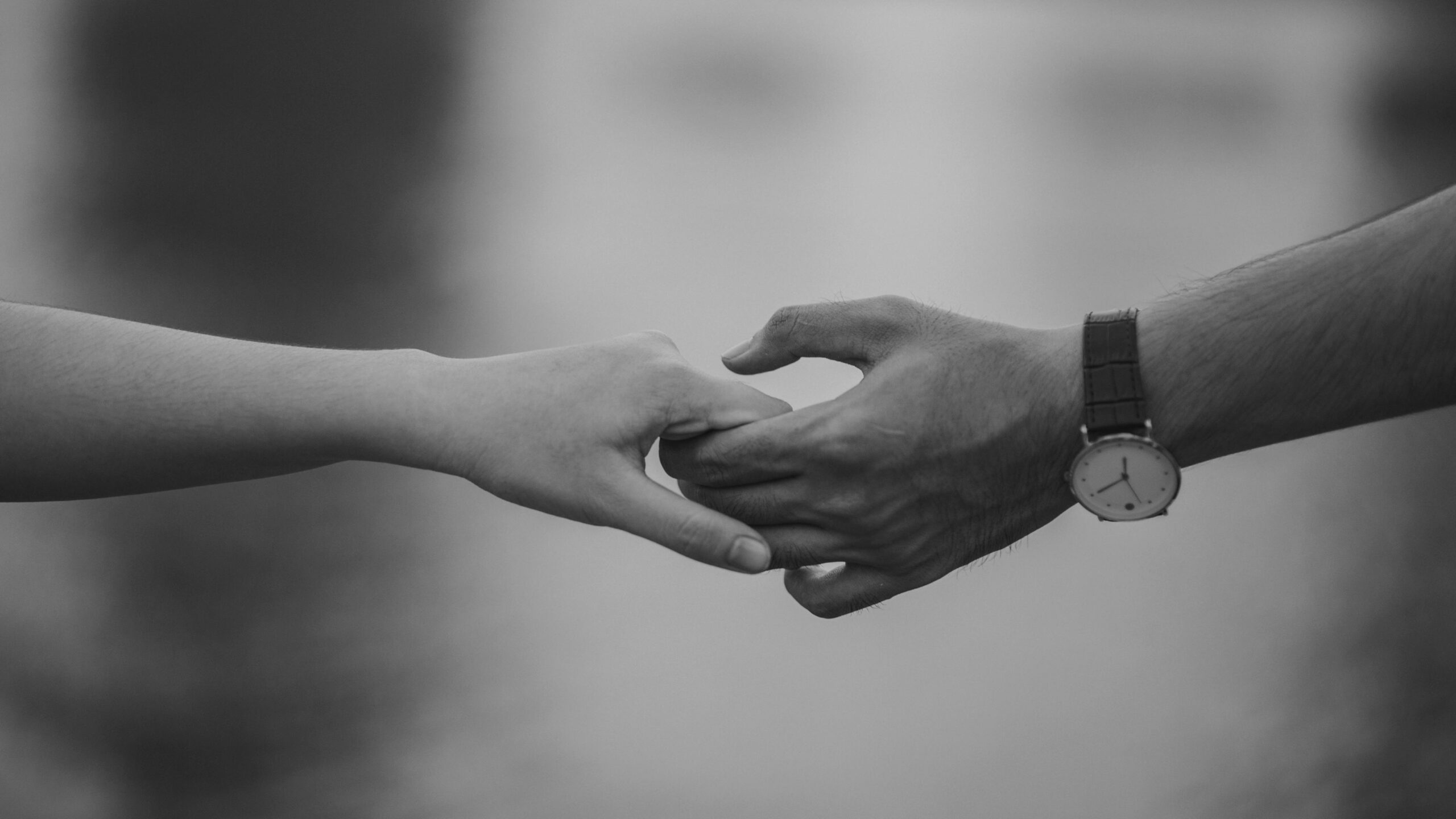 Two hands holding
